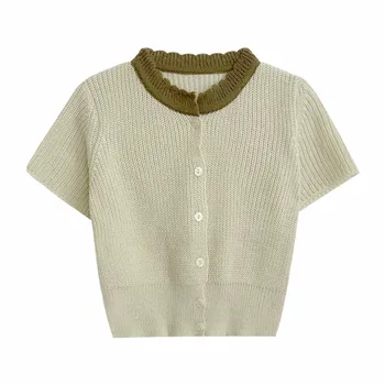 Годишната лейси однобортная риза от фино плетиво в контрастен цвят, с кръгло деколте.